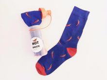 Load image into Gallery viewer, Adorable chili pepper socks that any hot sauce lover would enjoy as a gift. Chili pepper socks come in their own hot sauce container from www.pomelosocks.com. Unique food socks for a creative gift.

