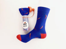 Load image into Gallery viewer, Unique food socks. These socks are full of chili peppers and come in their own hot sauce container. Food socks that make a creative gift from www.pomelosocks.com

