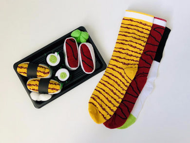 Three pairs of socks that are made to look like different types of sushi and come in their own sushi box set.  Sushi food socks that make for a creative gift from Pomelo Socks.